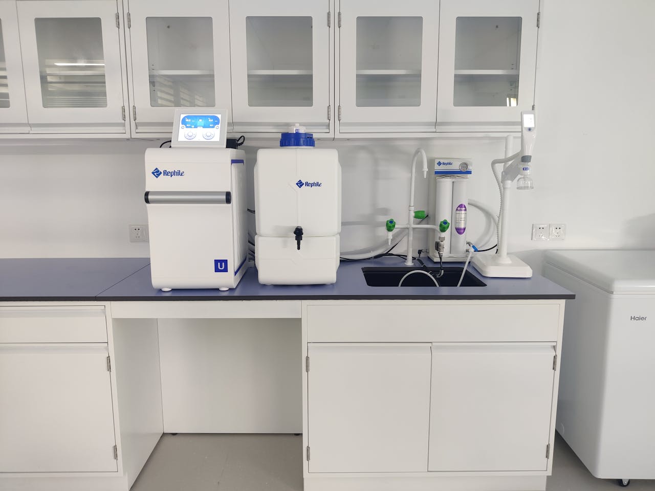 High-grade water purification system setup in a modern laboratory setting.